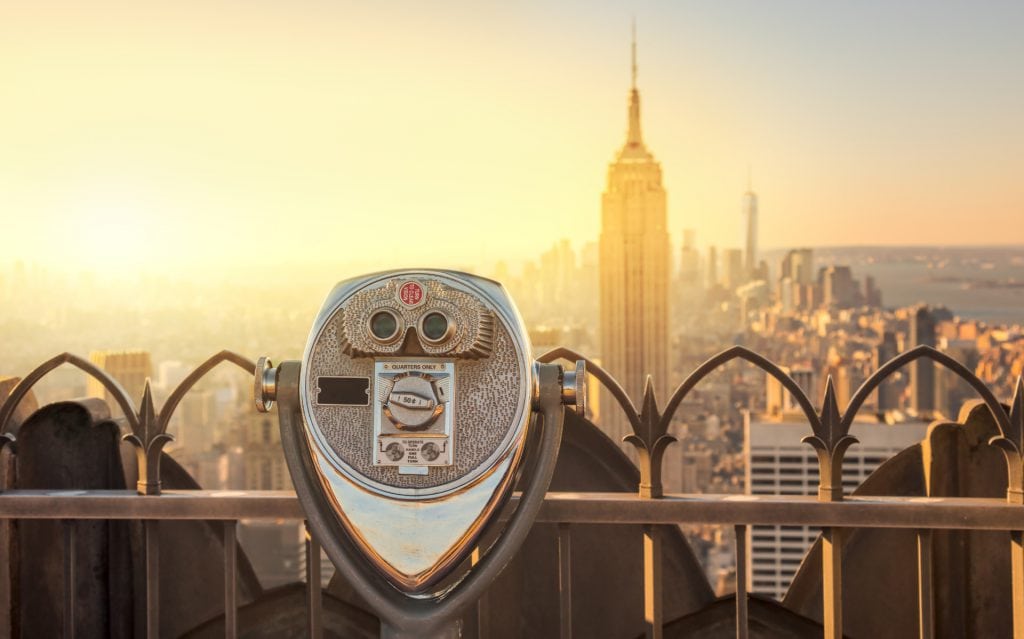 Tourist binoculars overlooking the Manhattan skyline in New York City at the morning
