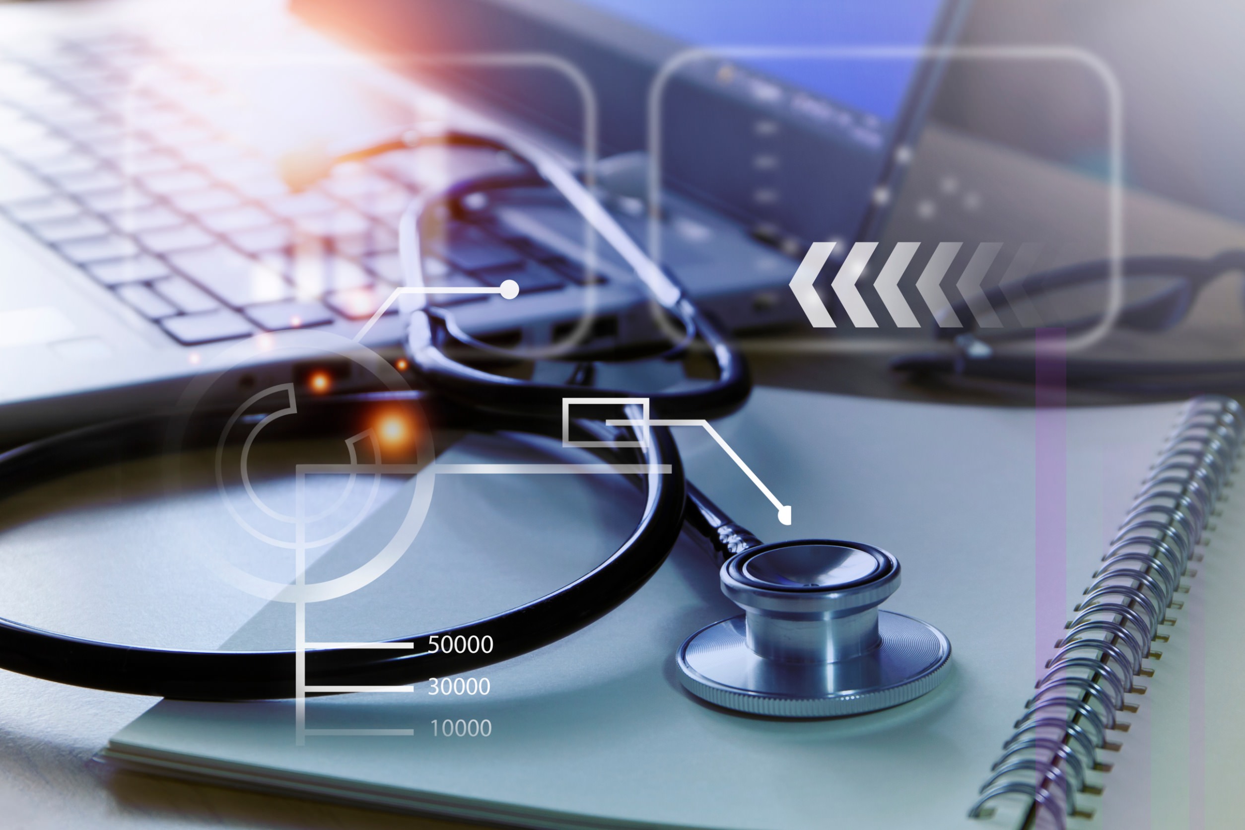 Abstract image of a stethoscope and laptop signifying healthcare innovation